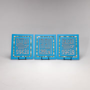 Elegance in Script: Wooden Set of Three Quls in Kufic Font 13 in (L) x 11 in (W) / Blue - Silver